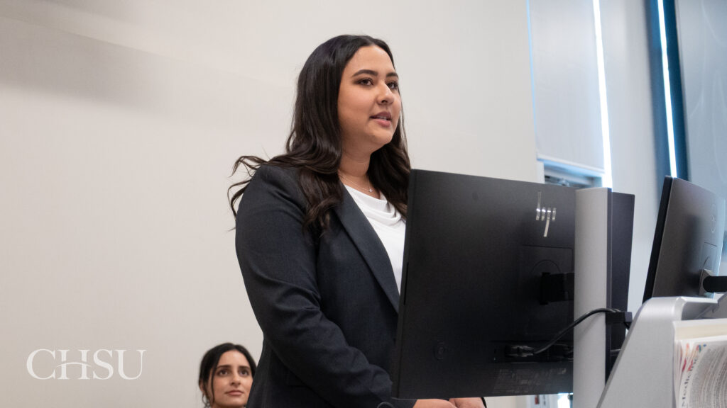 student presenting at CHSU Research Day