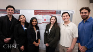 students presenting poster at CHSU Research Day
