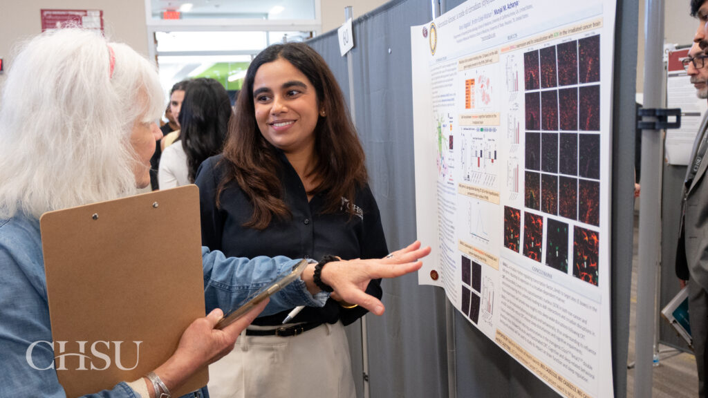 student presenting poster at CHSU Research Day