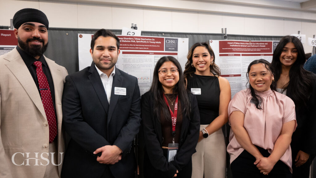 students presenting poster at CHSU Research Day