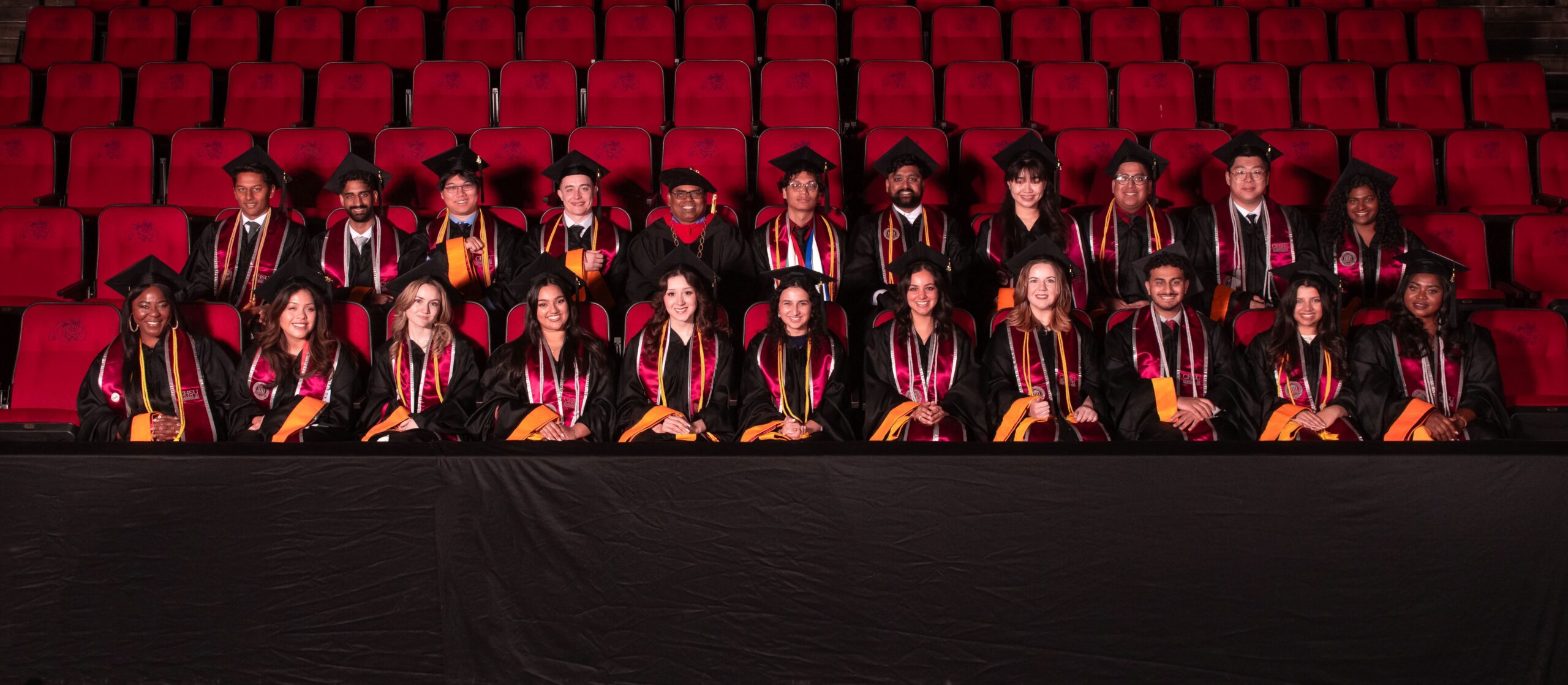 Group photo graduates in academic regalia